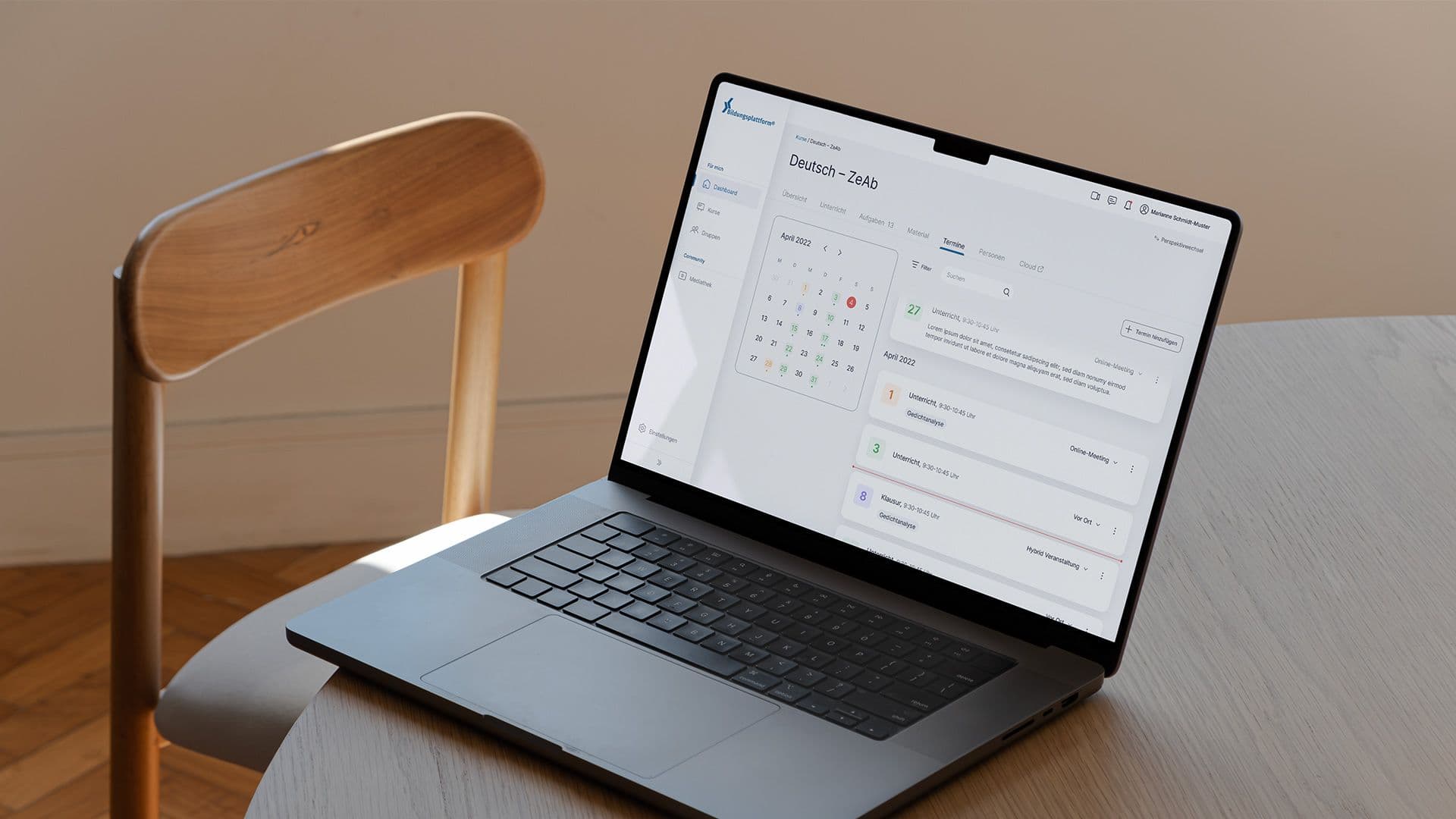 a laptop computer is sitting on top of a white table .