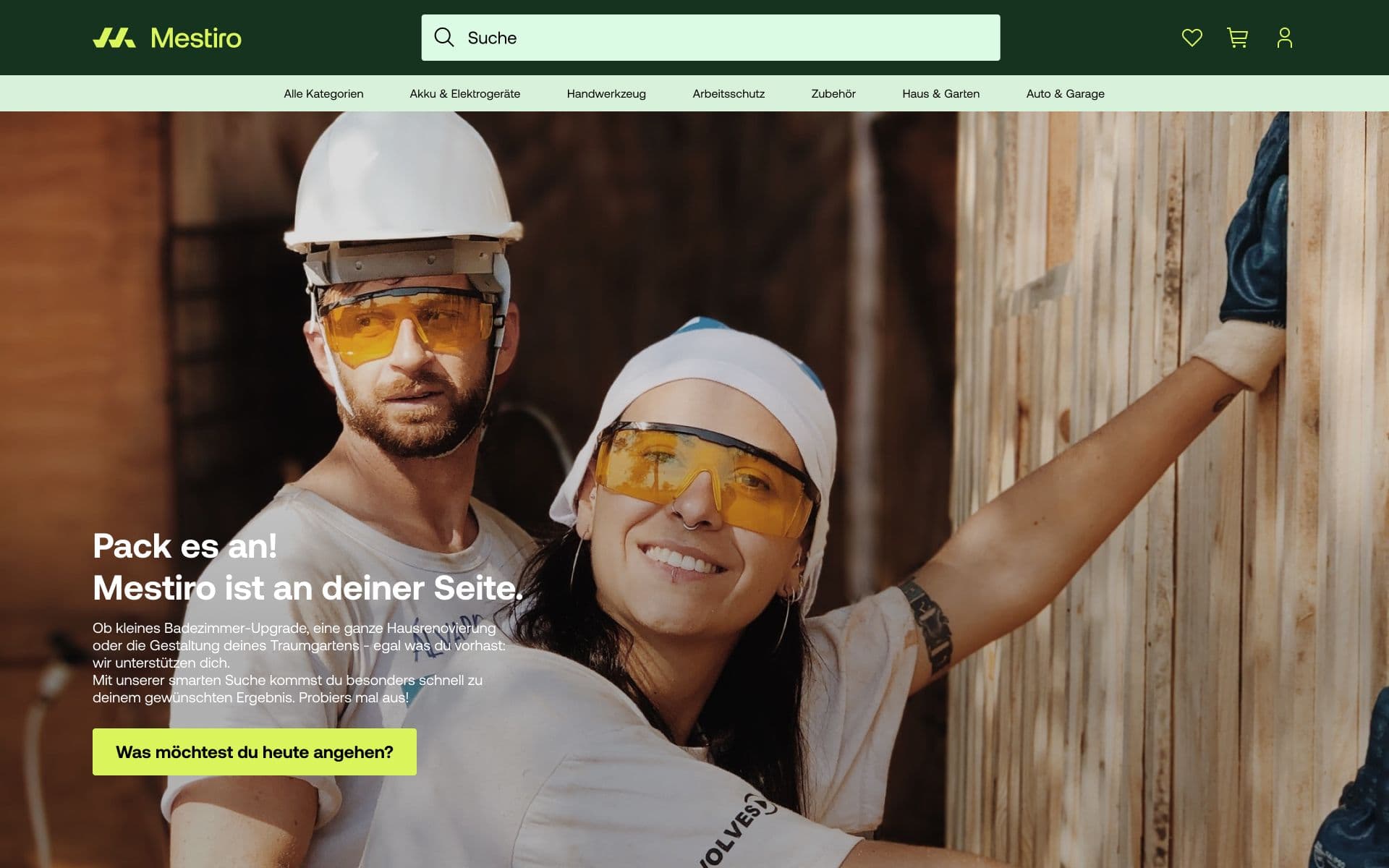 a man and a woman wearing hard hats and goggles are standing next to each other .